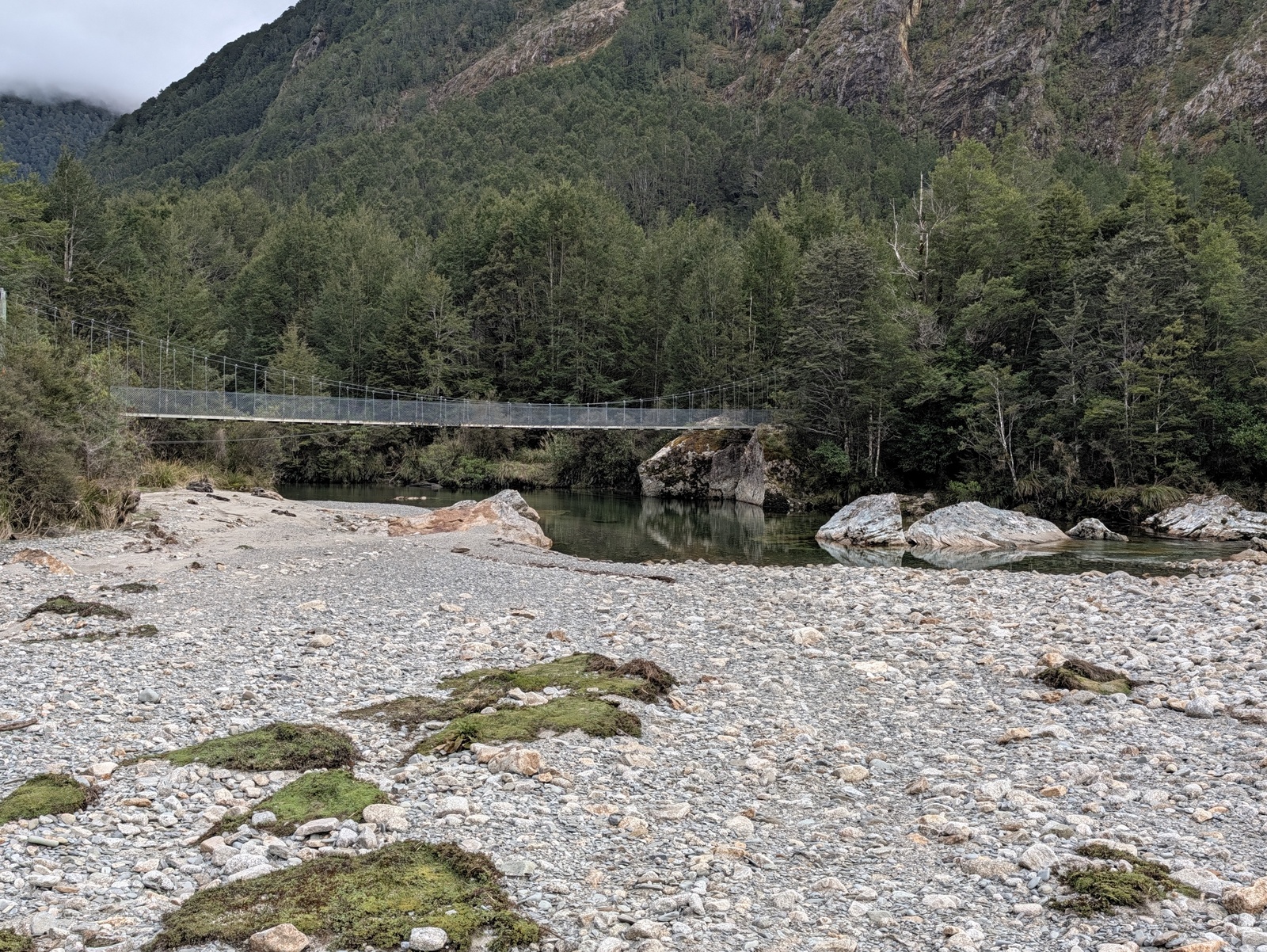 Swingbridge over the Karamea River from the flat near Trevor Carter Hut